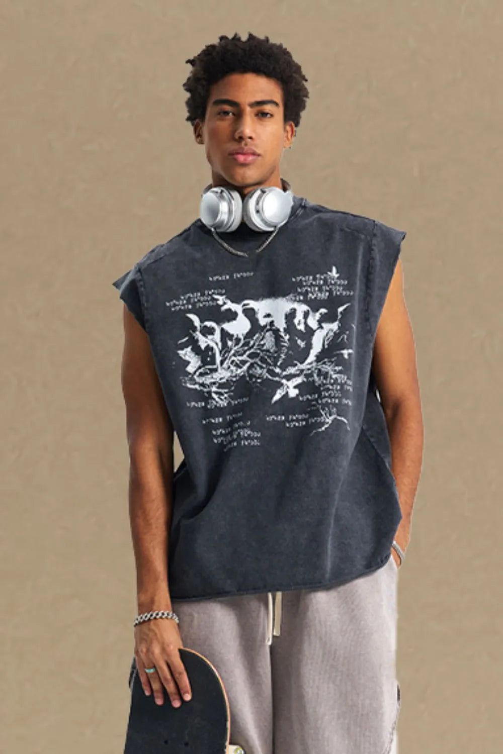 Black washed graphic sleeveless tee with raw edges and a crew neck.