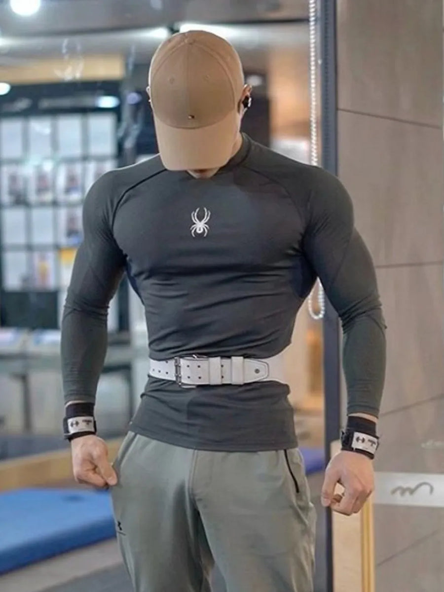 Sculpted Fit Performance Long Sleeve Top in dark grey with white spider logo, crew neck, and long sleeves.