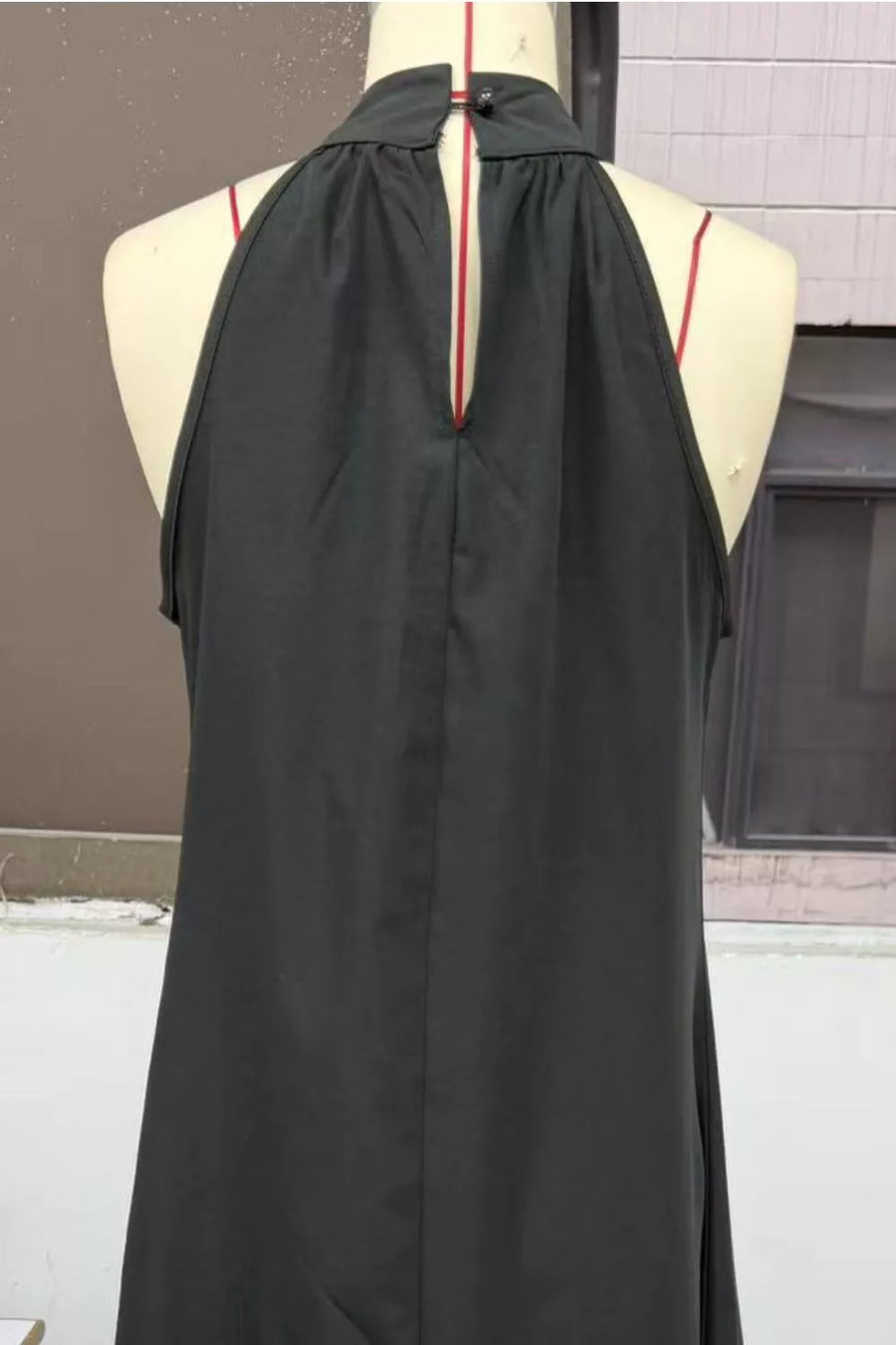 Black maxi dress with halter neckline and keyhole detail on back