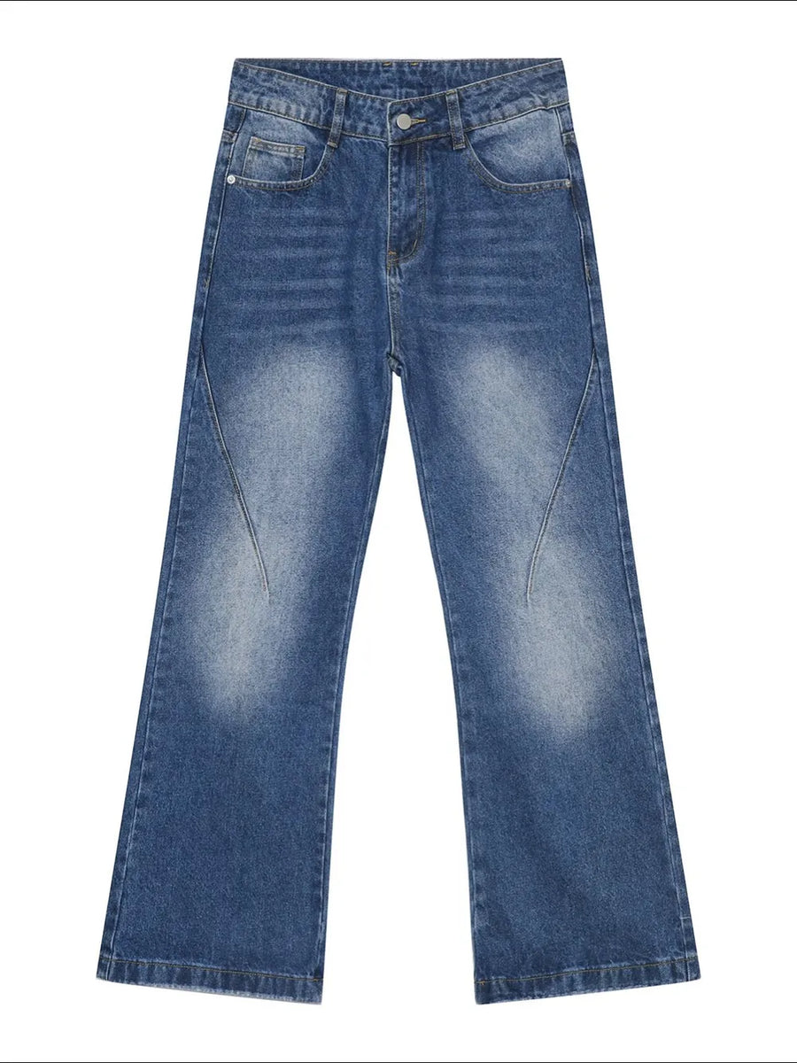 Faded flare jeans in medium wash denim with sculpted seam detail