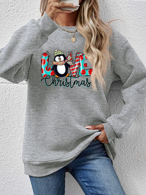Grey sweatshirt with festive penguin graphic and "Love Christmas" text