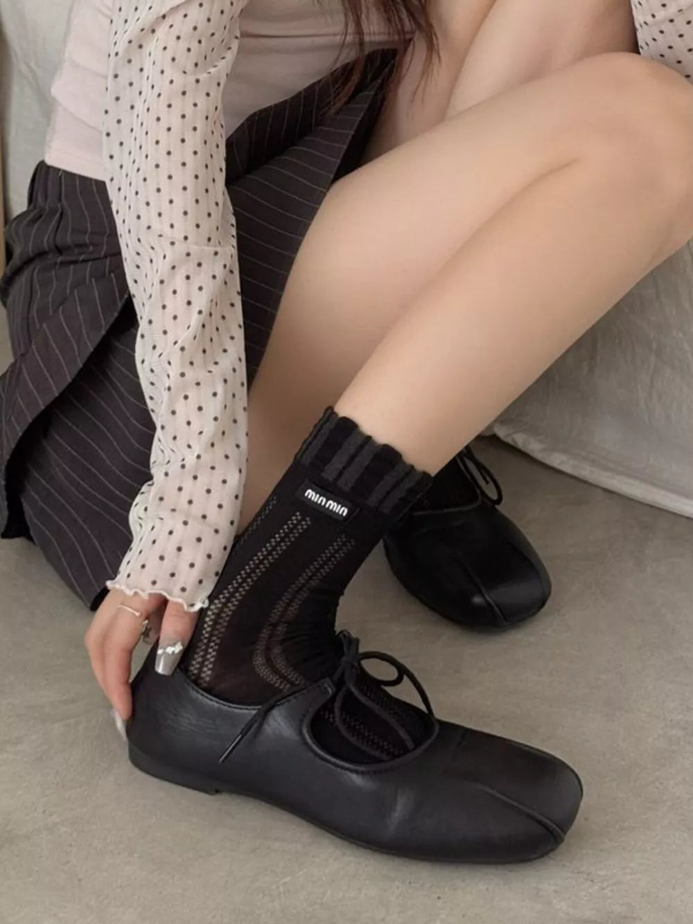 socks in black featuring sheer and regular fit