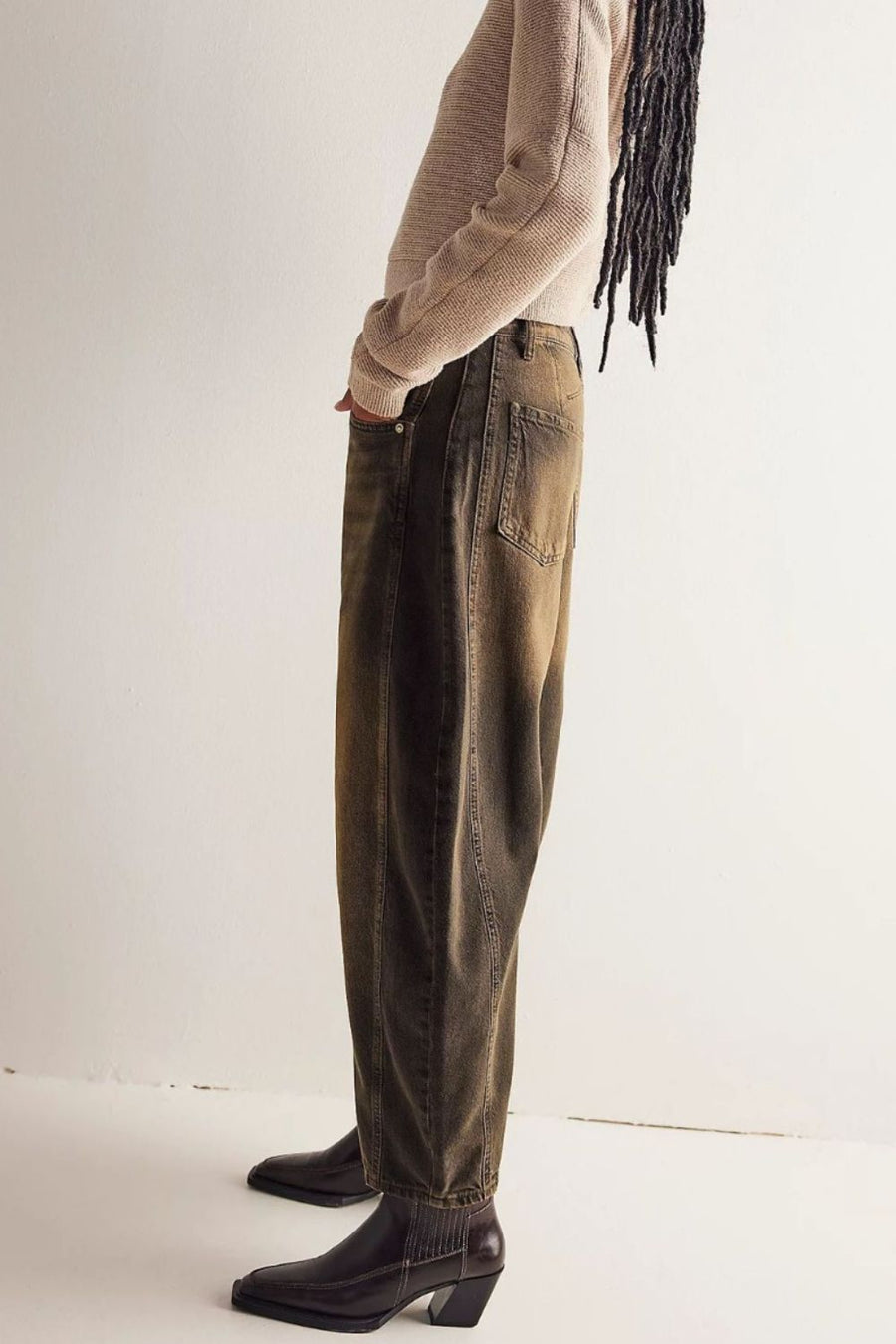 Barrel leg jeans in Olive Brown denim with a relaxed fit and visible stitching details.