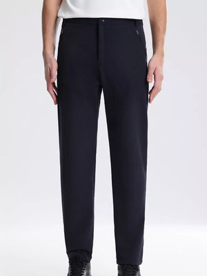 Navy blue sweatpants with zippered pockets and a comfortable fit.