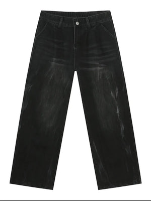 Pleated wide-leg distressed dark wash denim trousers with a casual fit.