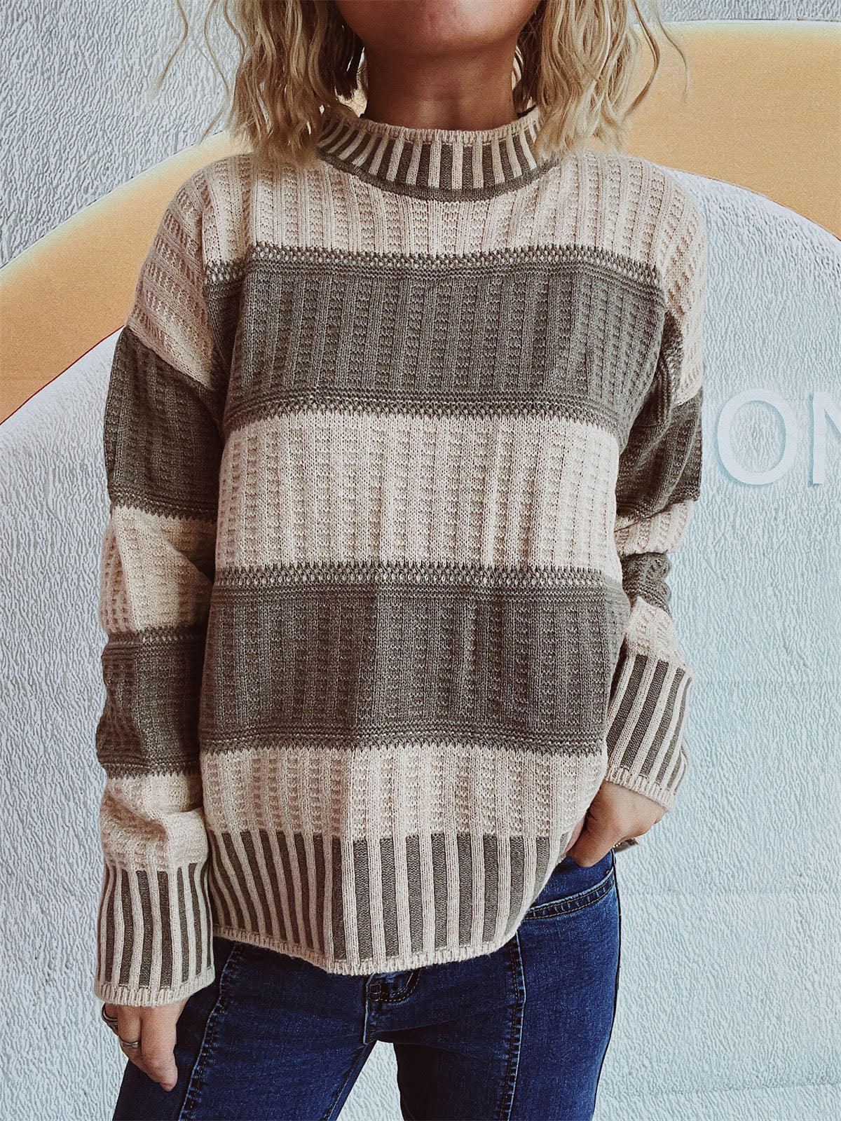 Textured stripe mock neck knit sweater in caramel and olive acrylic with a waffle knit detail.
