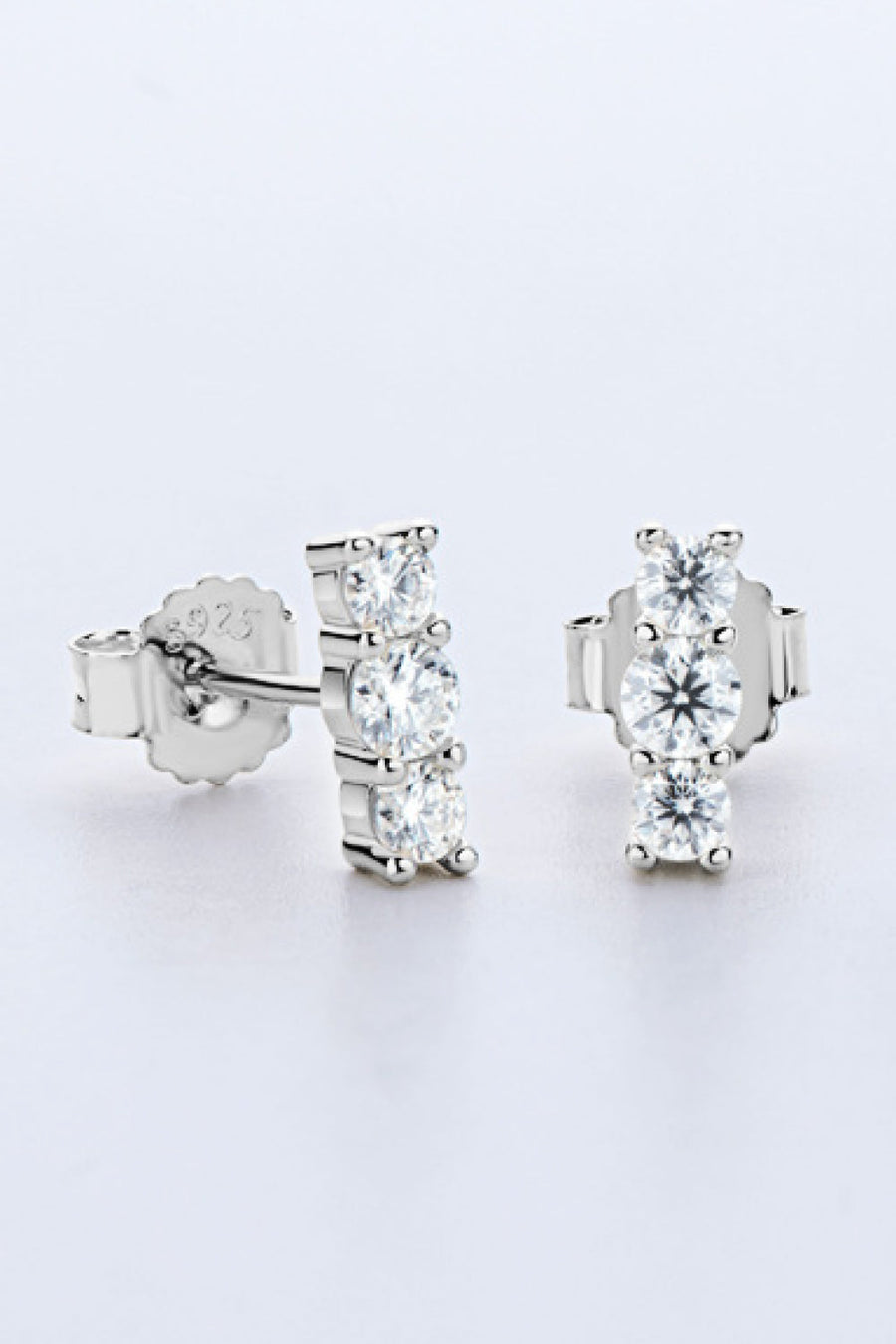 Silver triple stone bar stud earrings with clear cubic zirconia stones