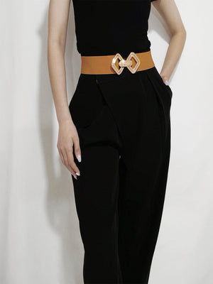Ochre elasticated waist belt with gold geometric buckle detail