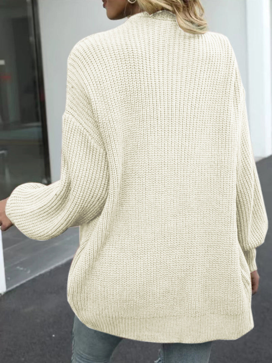 Chunky knit cocoon cardigan in tan with balloon sleeves and a relaxed fit.