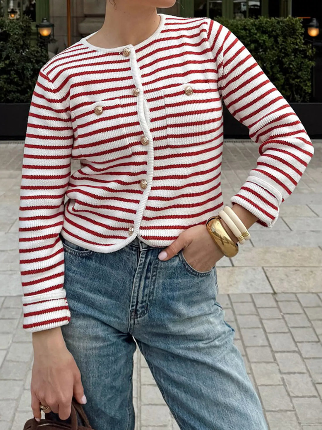 Buttoned red and white striped knit cardigan with gold buttons and a crew neck.