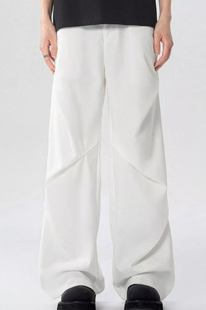 White men's wide-leg sweatpants with pockets and a relaxed fit.
