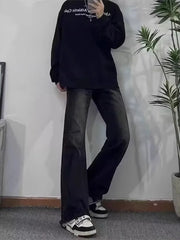 Men's dark wash cotton flare jeans with pockets and frayed hem.