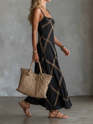 100% polyester Care instructions: Machine wash cold maxi dress in Black with A-line silhouette