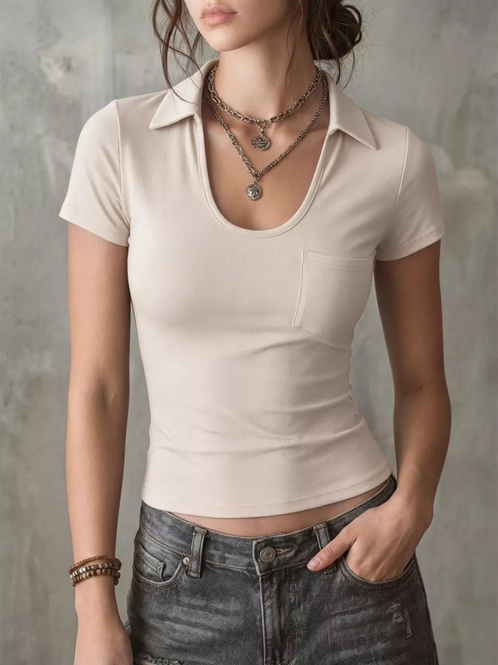 Scoop neck slim fit polo t-shirt in cream with a chest pocket.