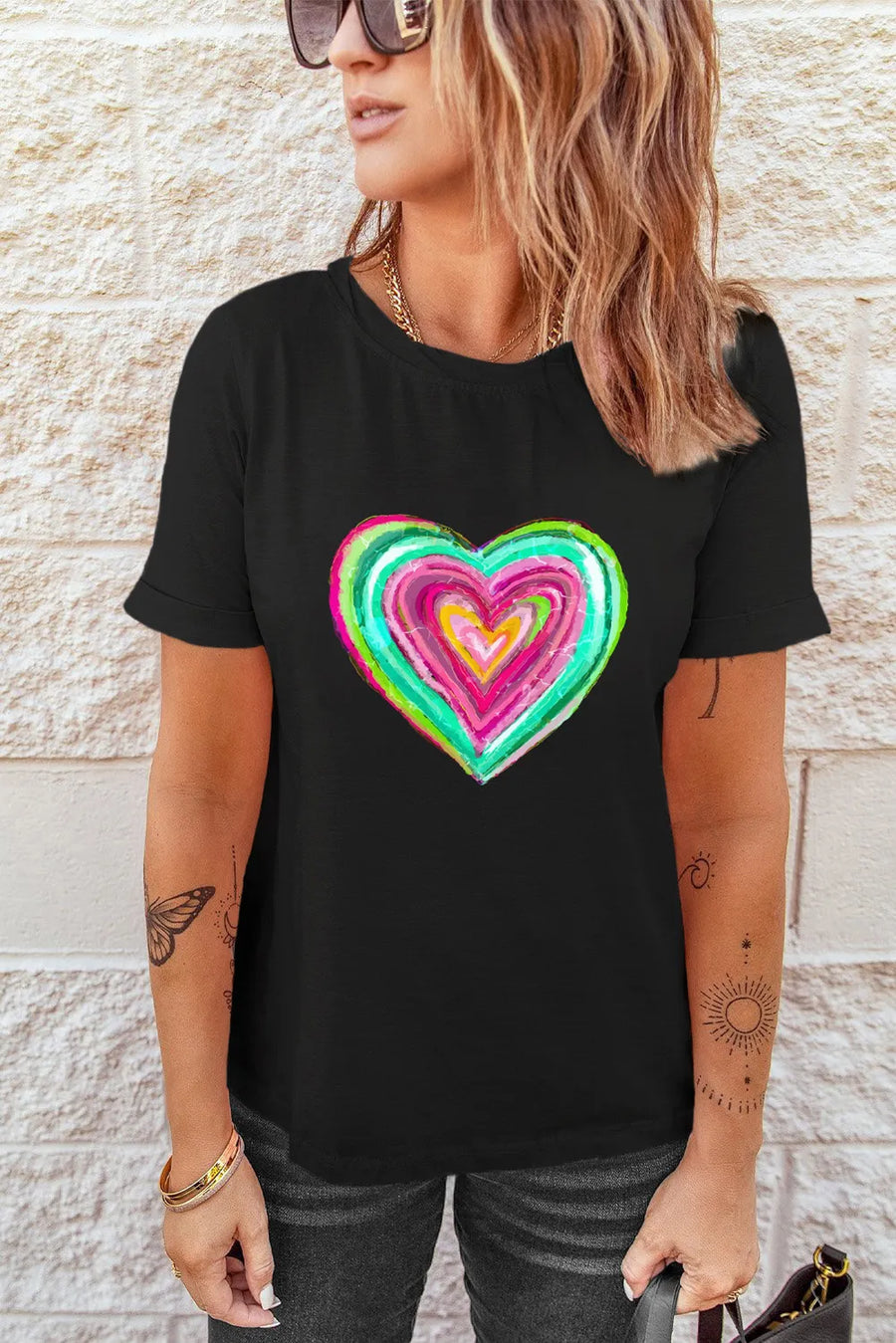 Black crew neck tee with a colorful painted heart graphic.