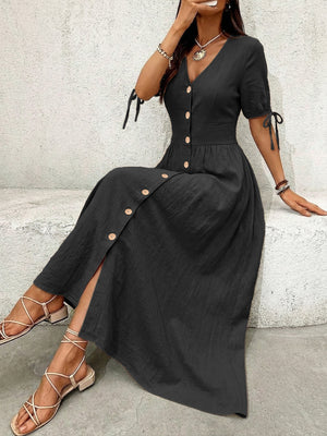 Black button-down midi dress with tie sleeve details and v-neckline