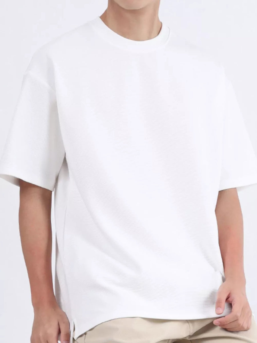 Men's white textured cotton round neck t-shirt with short sleeves.