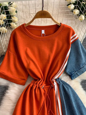 Orange red color block casual dress with drawstring waist and white stripes.