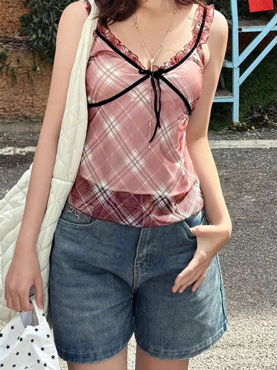 Plaid ruffle trim tank top in pink with black trim and tie detail.