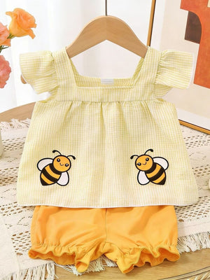 Yellow gingham baby top with bee embroidery and ruffled shorts set