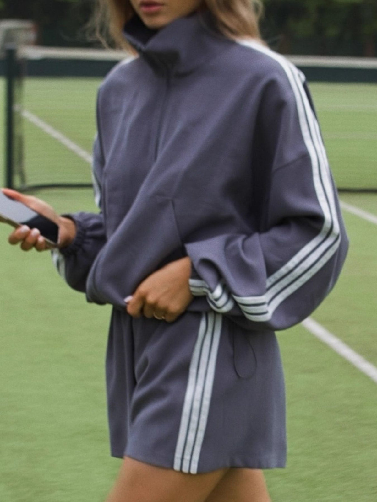 slate gray track jacket with striped and mock neck