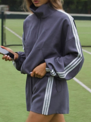 slate gray track jacket with striped and mock neck