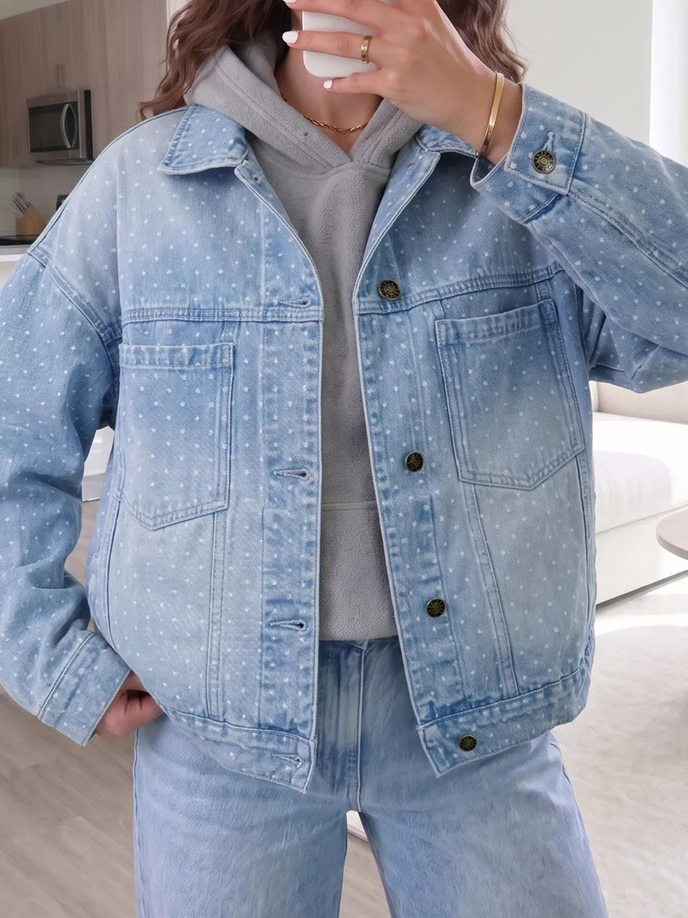 light blue denim jacket with hip-length and button-front