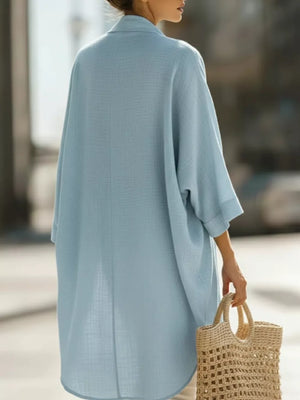 Black cardigan with hip-length and open-front
