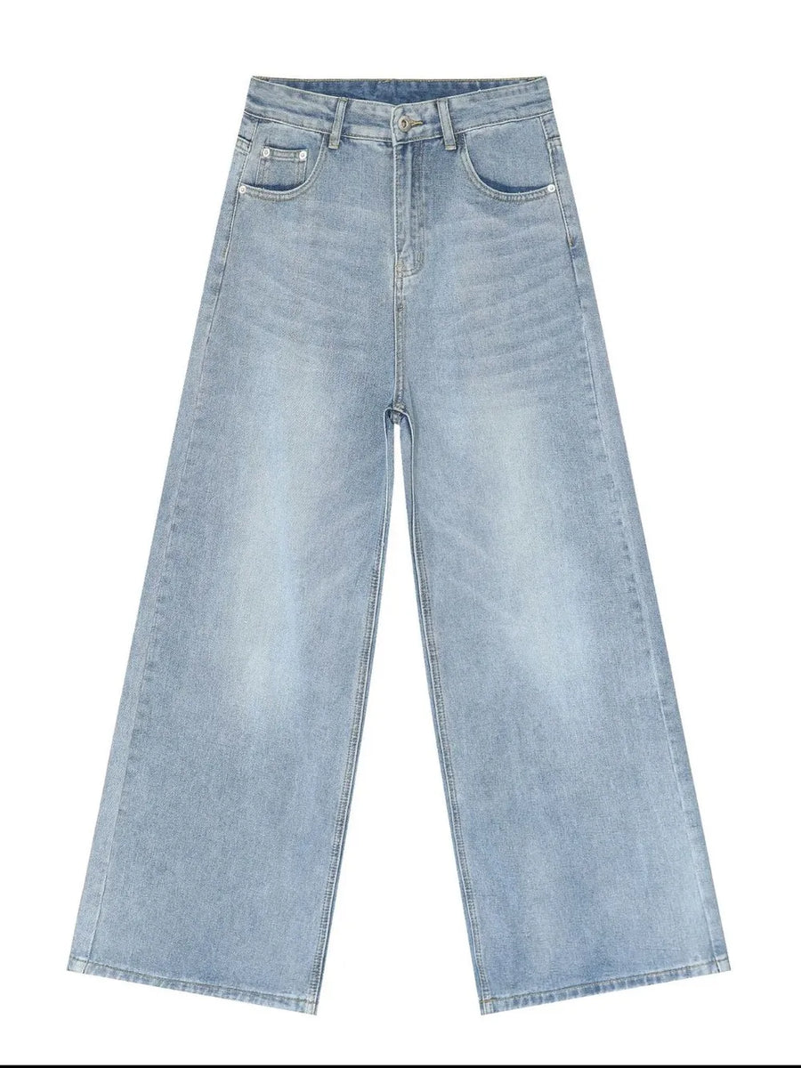 Light blue denim palazzo trousers with a wide leg and buttoned fly.