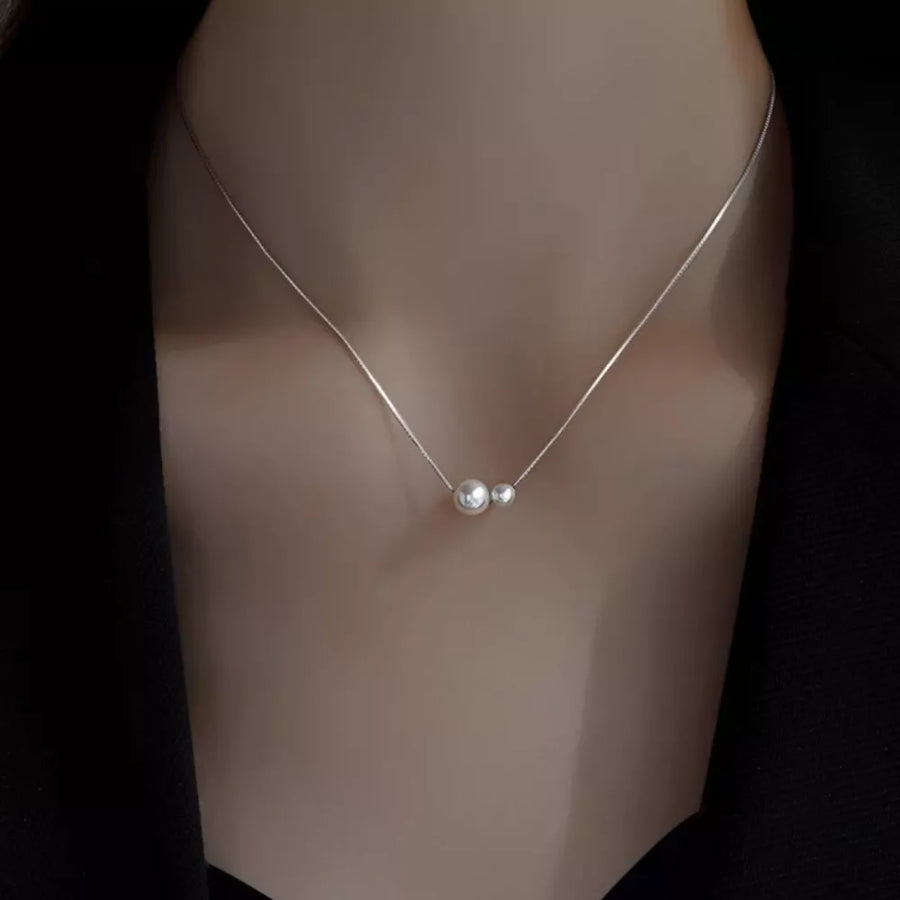 Synthetic Pearl,925 sterling silver Care instructions: Avoid wearing during exer necklace in Cream with straight silhouette