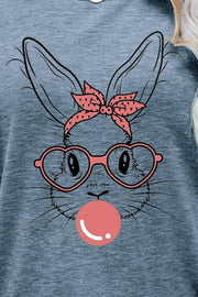 Heather Gray t-shirt with a graphic of a bunny wearing glasses and a pink polka dot bandana, blowing a pink bubble.