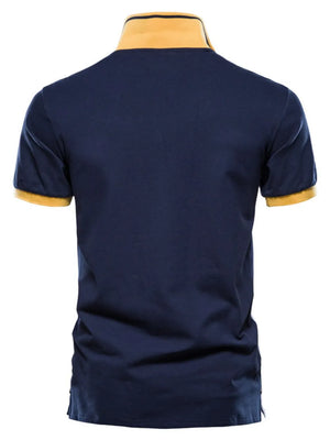 Navy polo shirt with yellow collar and sleeve trim, short sleeves, casual style.