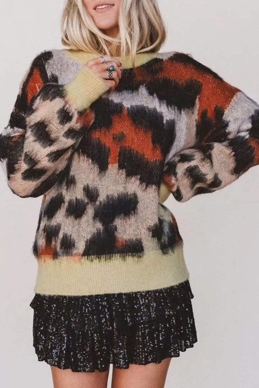 52% viscose, 26% polyester, 22% polyamide Care instructions: Machine wash cold pullover sweater in cream with relaxed