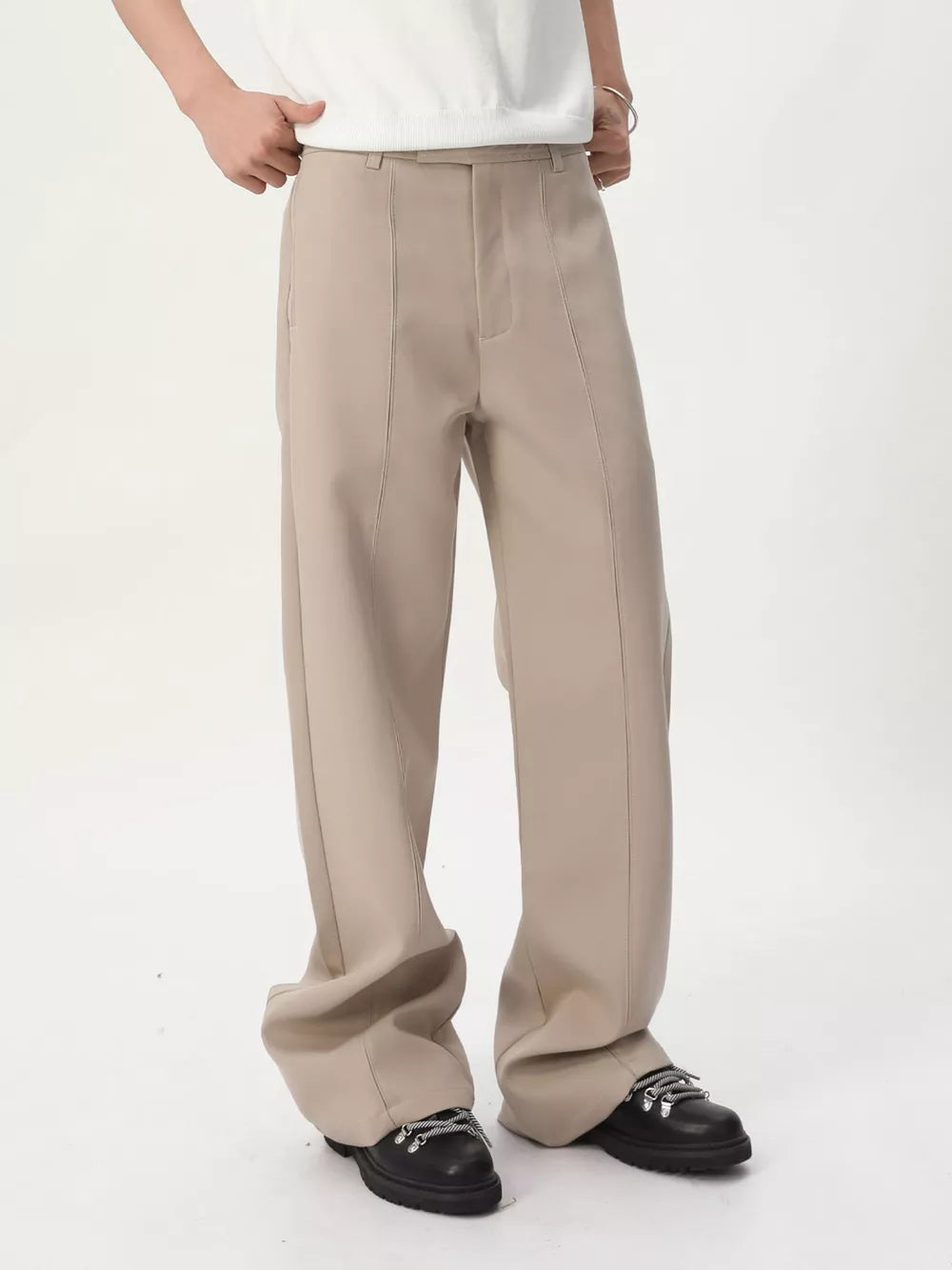 Apricot wide-leg sweatpants with front seam detail and adjustable waist.