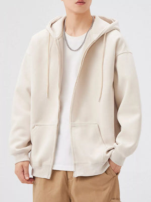 Casual loose fit zip-up hoodie in apricot with drawstring hood and front pockets.