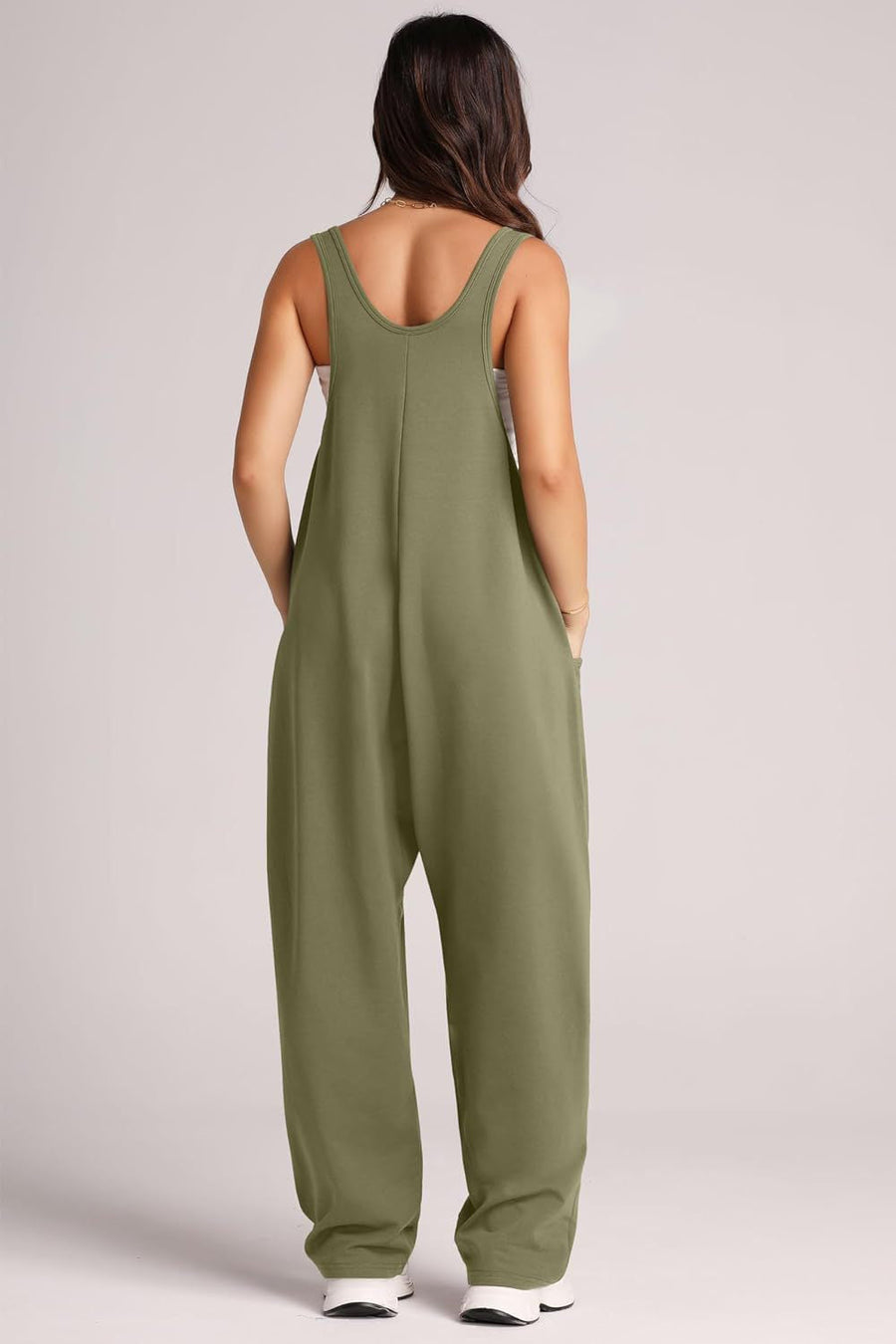 Relaxed fit pocketed tank jumpsuit in Matcha Green with wide legs and side pockets.