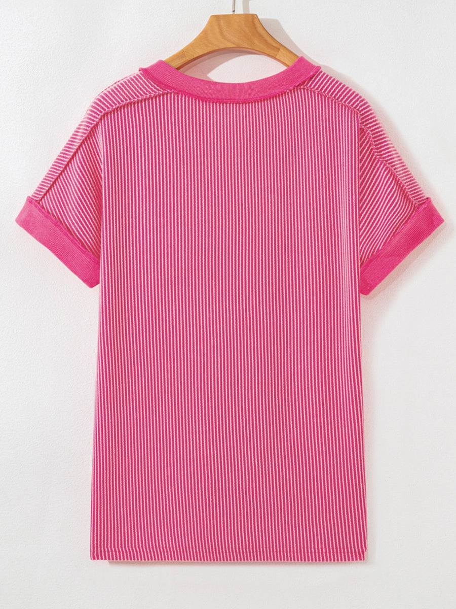 Pink striped tee with cuffed short sleeves and a crew neck.