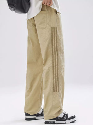 Khaki loose fit men's joggers with side stripe detail and drawstring waist.