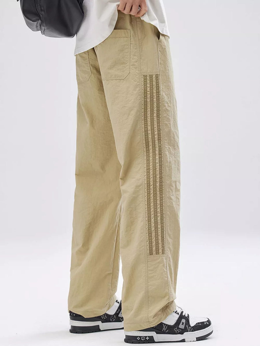 Khaki loose fit men's joggers with side stripe detail and drawstring waist.