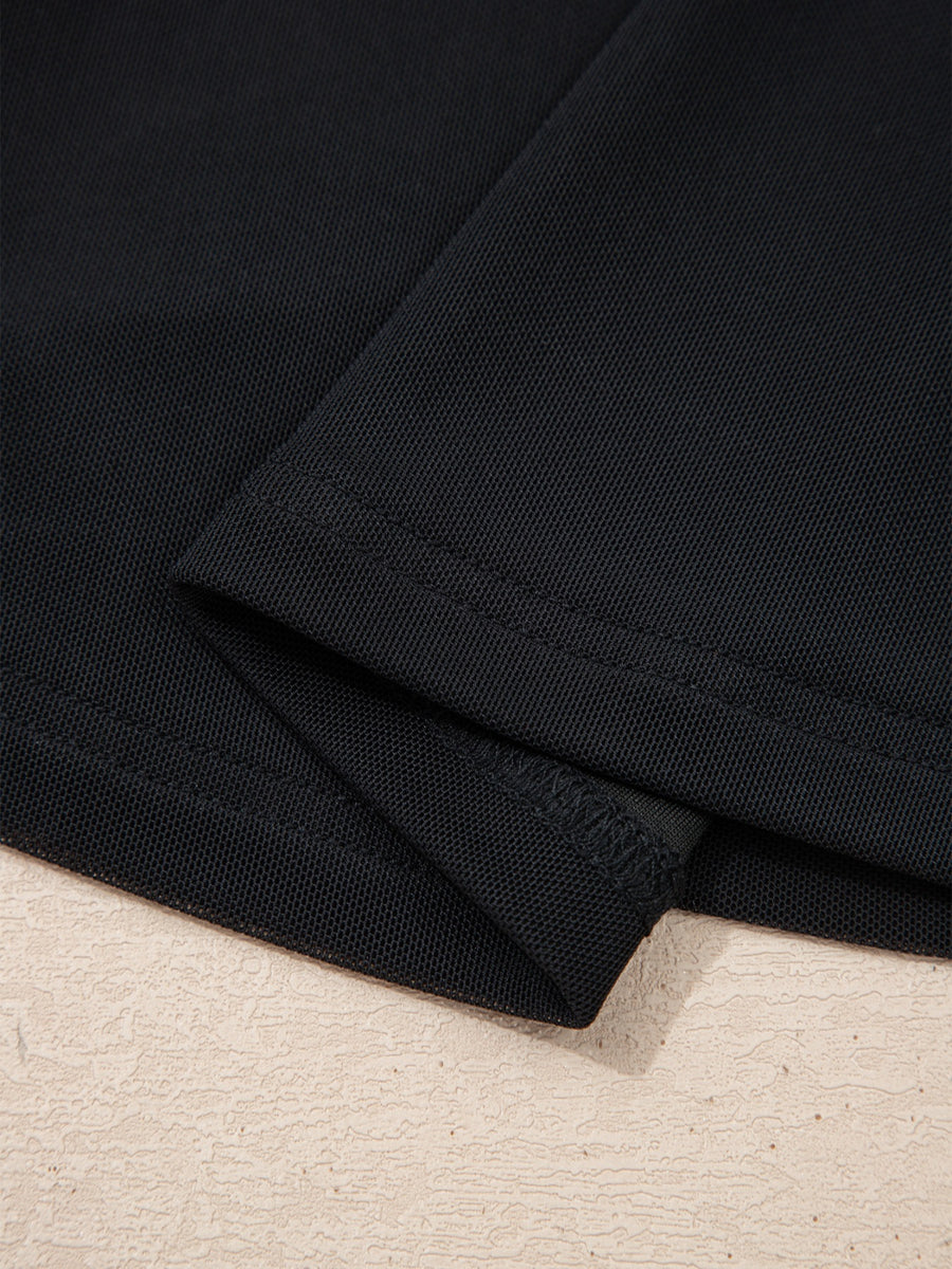 Black sheer mesh t-shirt with cap sleeves, showing fabric texture and seams.