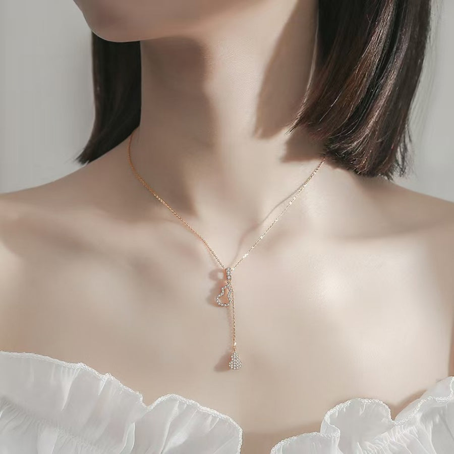 18K Rose Gold-Plated,925 sterling silver,Zircon Care instructions: Avoid wearing necklace in Rose Gold with lariat silhouette