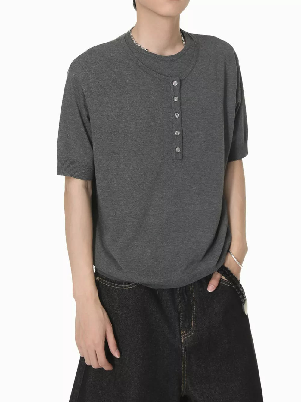 Charcoal short sleeve henley t-shirt with button placket and crew neck.