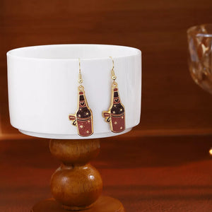 earrings featuring cow print in gold with 18K Gold-Plated, Resin, Zinc alloy Care instructions: Avoid wearing during exerc