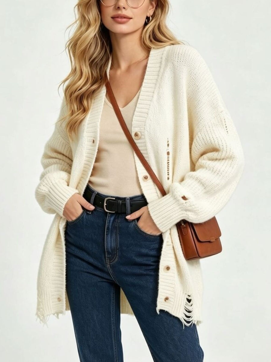 cardigan in ivory featuring distressed and oversized fit