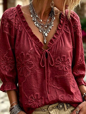 White blouse featuring embroidered and floral