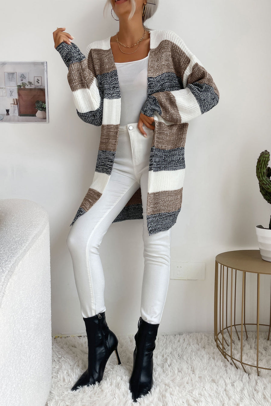 Open-front knit cardigan with horizontal stripes in khaki, black, white, and dark gray.