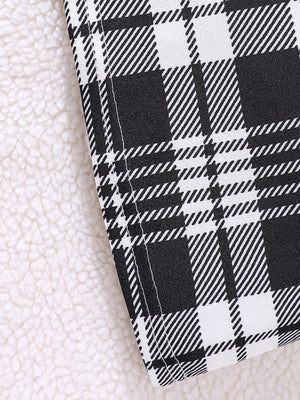 Children's black and white plaid fuzzy cardigan detail with sherpa lining.