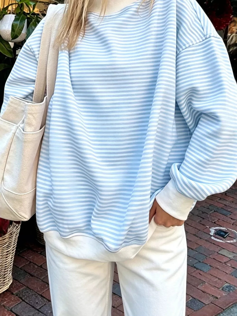 light blue sweatshirt with striped and crew neck
