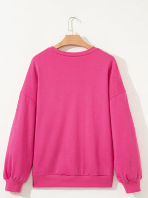 Pink cotton crew neck sweatshirt with embroidered lucky clover detail