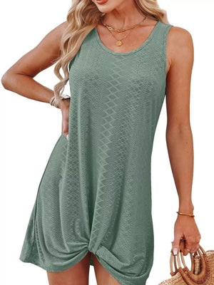 Green eyelet tank dress with twisted hem detail and scoop neckline.